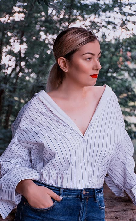Woman Looking Side Outdoors Shirt | How To Style An Oversized Shirt: Types, Tips &Amp; Outfit Ideas Woman looking side outdoors shirt