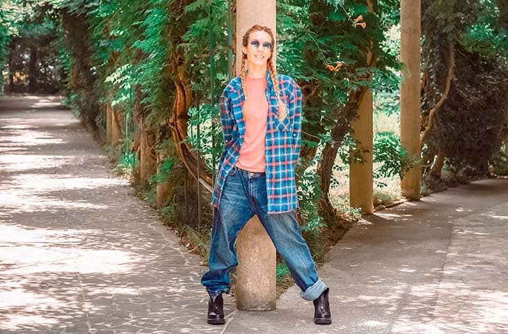 Woman Posing Outdoors Sunglasses Oversized Shirt | How To Style An Oversized Shirt: Types, Tips &Amp; Outfit Ideas Woman posing outdoors sunglasses oversized shirt
