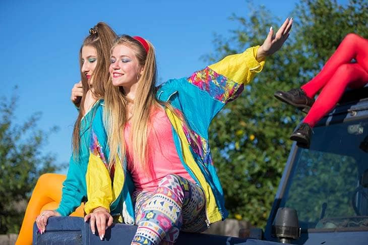 Two woman colorful outfit outdoors