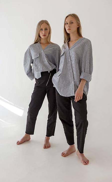 Two Women Posing Looking Camera Striped Shirts | How To Style An Oversized Shirt: Types, Tips &Amp; Outfit Ideas Two women posing looking camera striped shirts