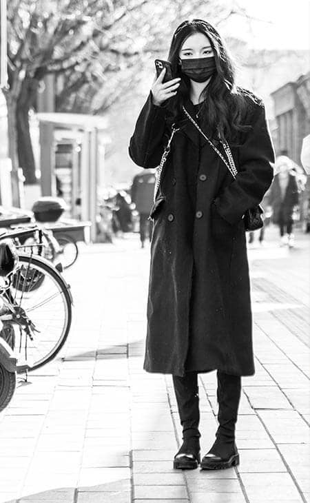 Woman street listening phone