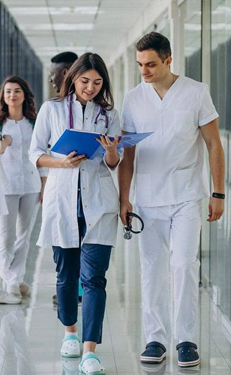 Team young doctors corridor hospital